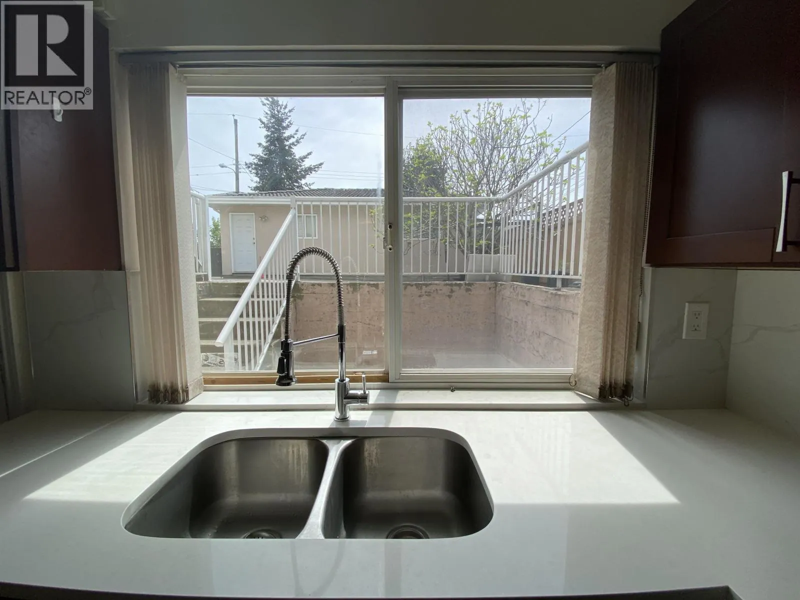Half Basement 1688 E 59TH AVENUE