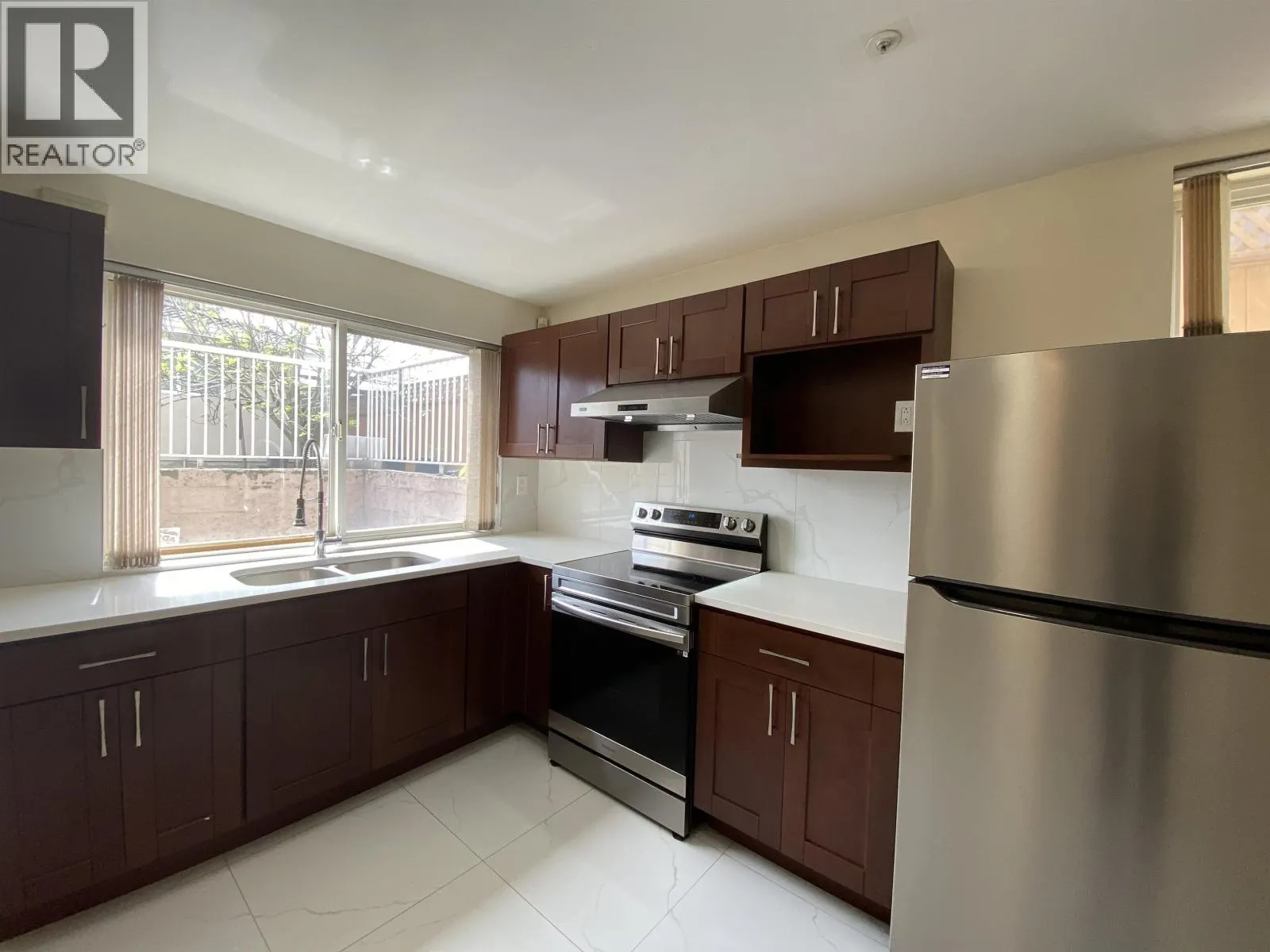Half Basement 1688 E 59TH AVENUE