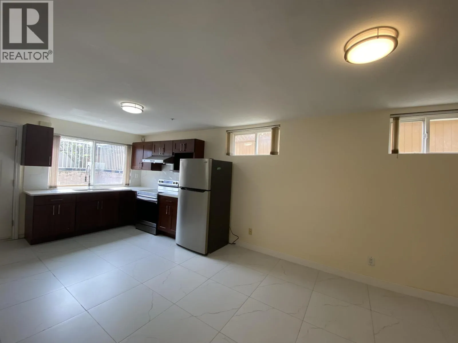 Half Basement 1688 E 59TH AVENUE
