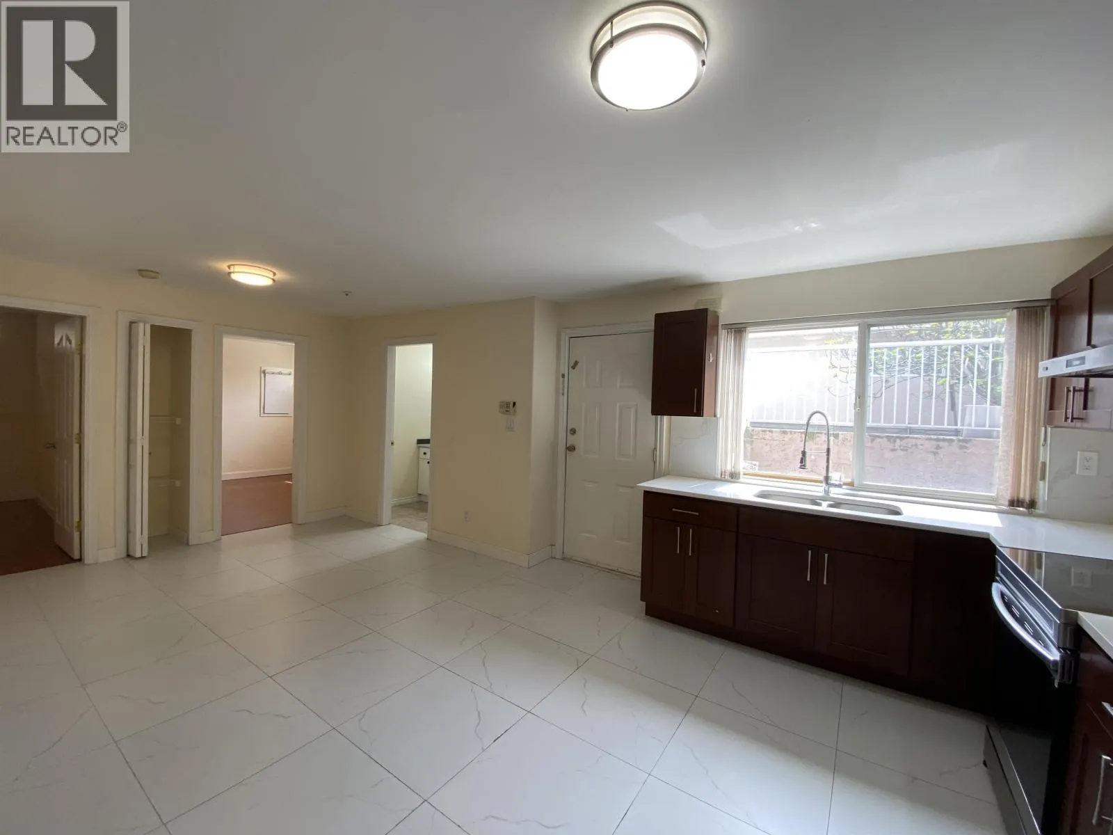 Half Basement 1688 E 59TH AVENUE