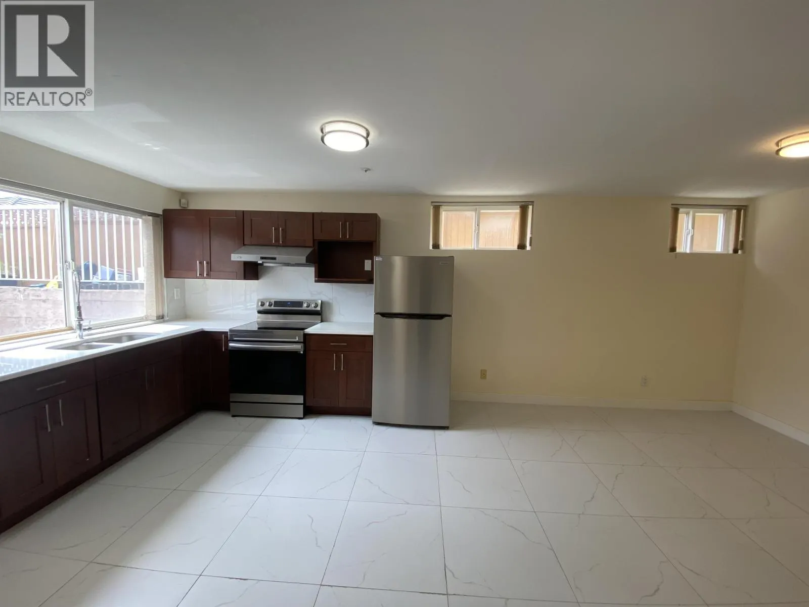 Half Basement 1688 E 59TH AVENUE