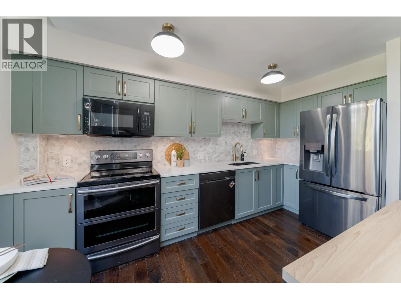 304 6888 STATION HILL DRIVE