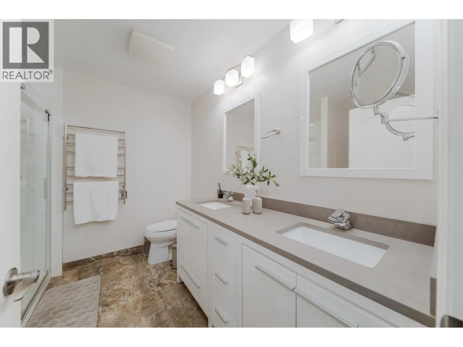 304 6888 STATION HILL DRIVE