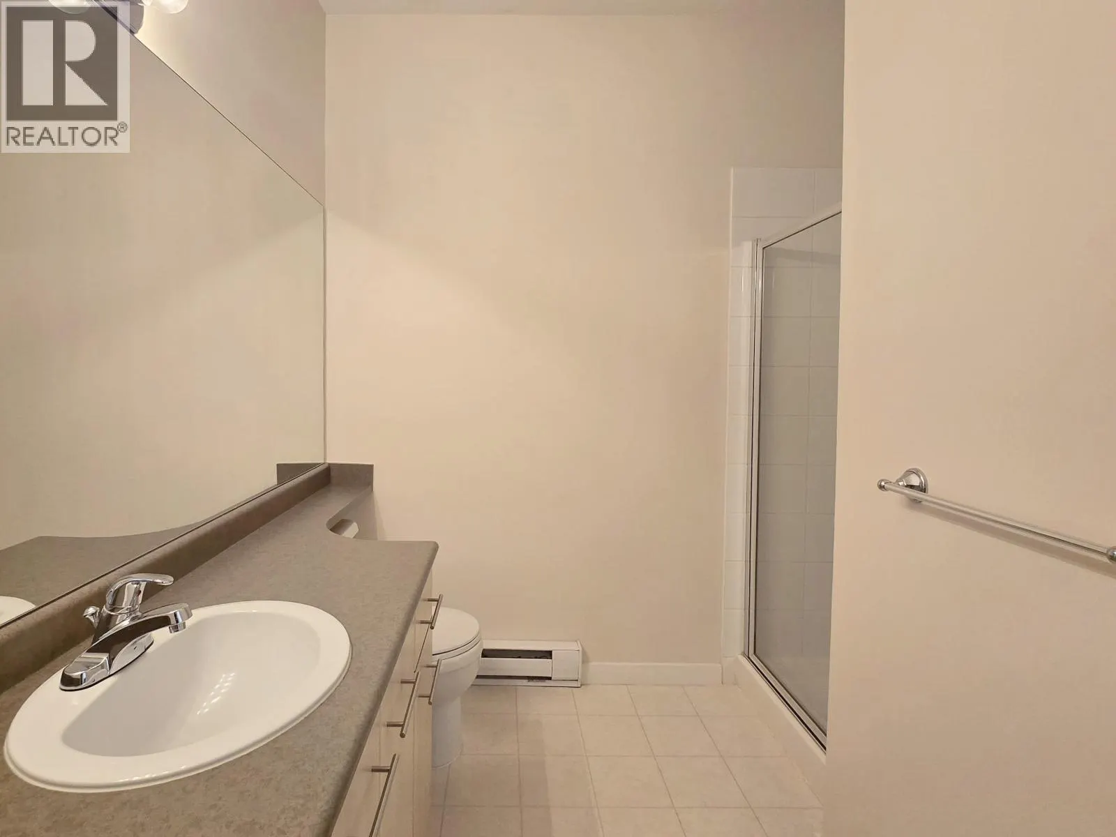 1427 5133 GARDEN CITY ROAD