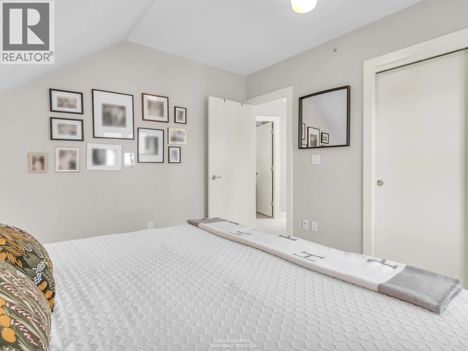 91 E 27TH AVENUE