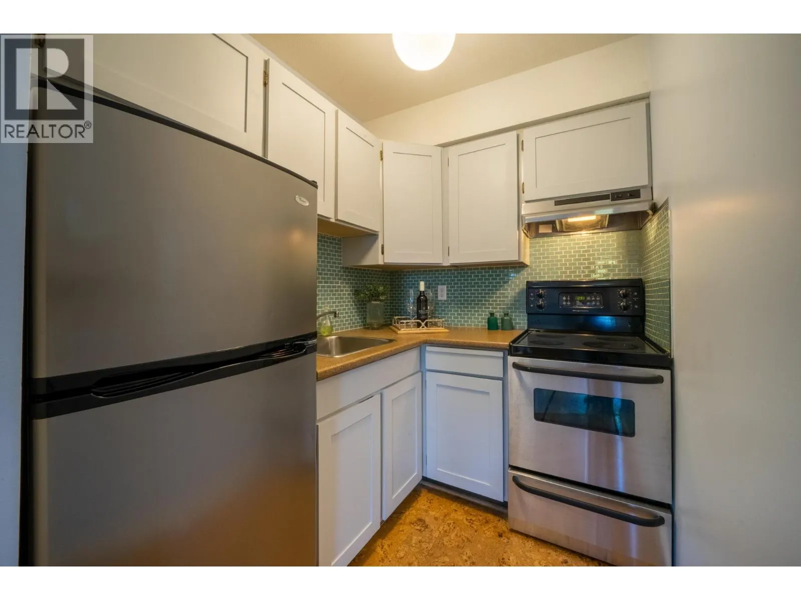 210 3465 GLEN DRIVE