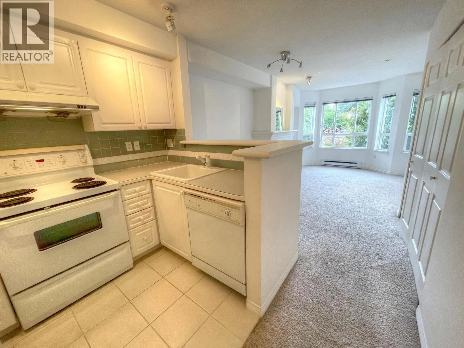 306 2545 W BROADWAY