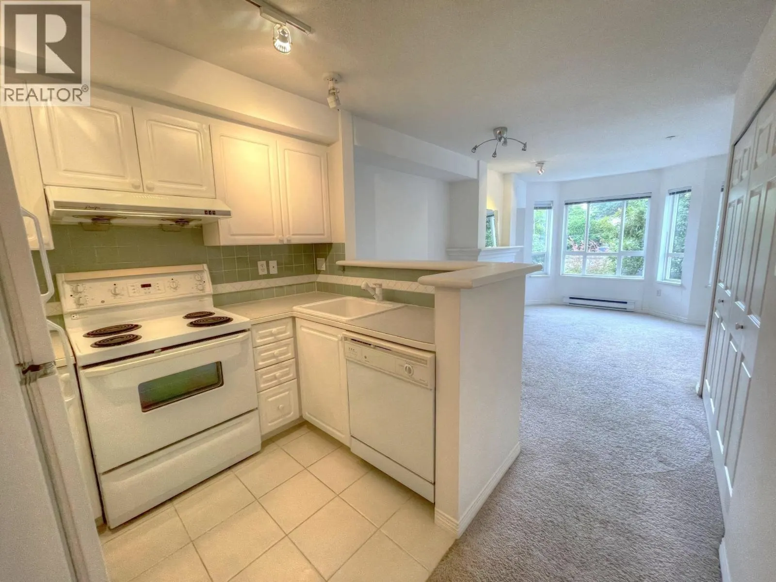 306 2545 W BROADWAY