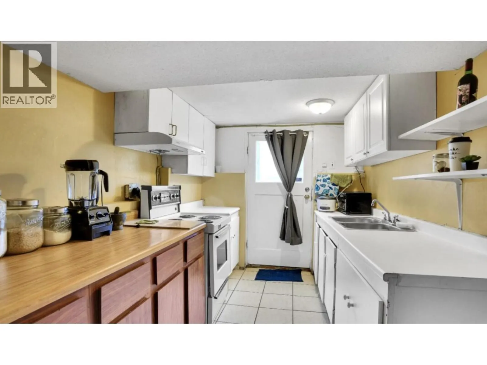 1441 W 49TH AVENUE