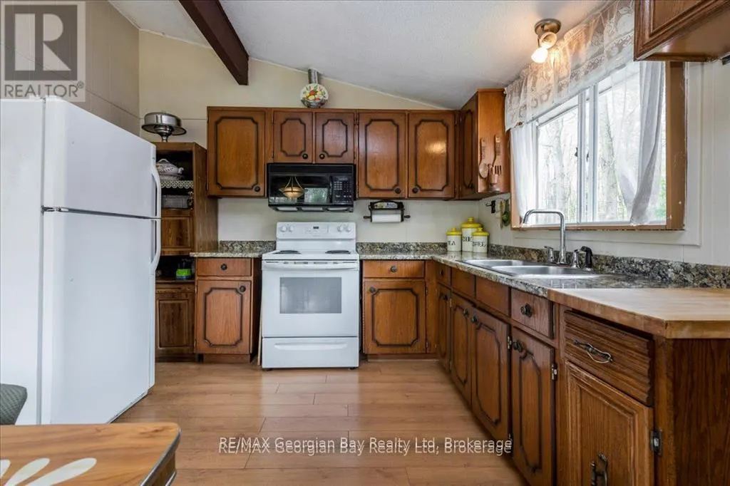 25 TALL PINES DRIVE W