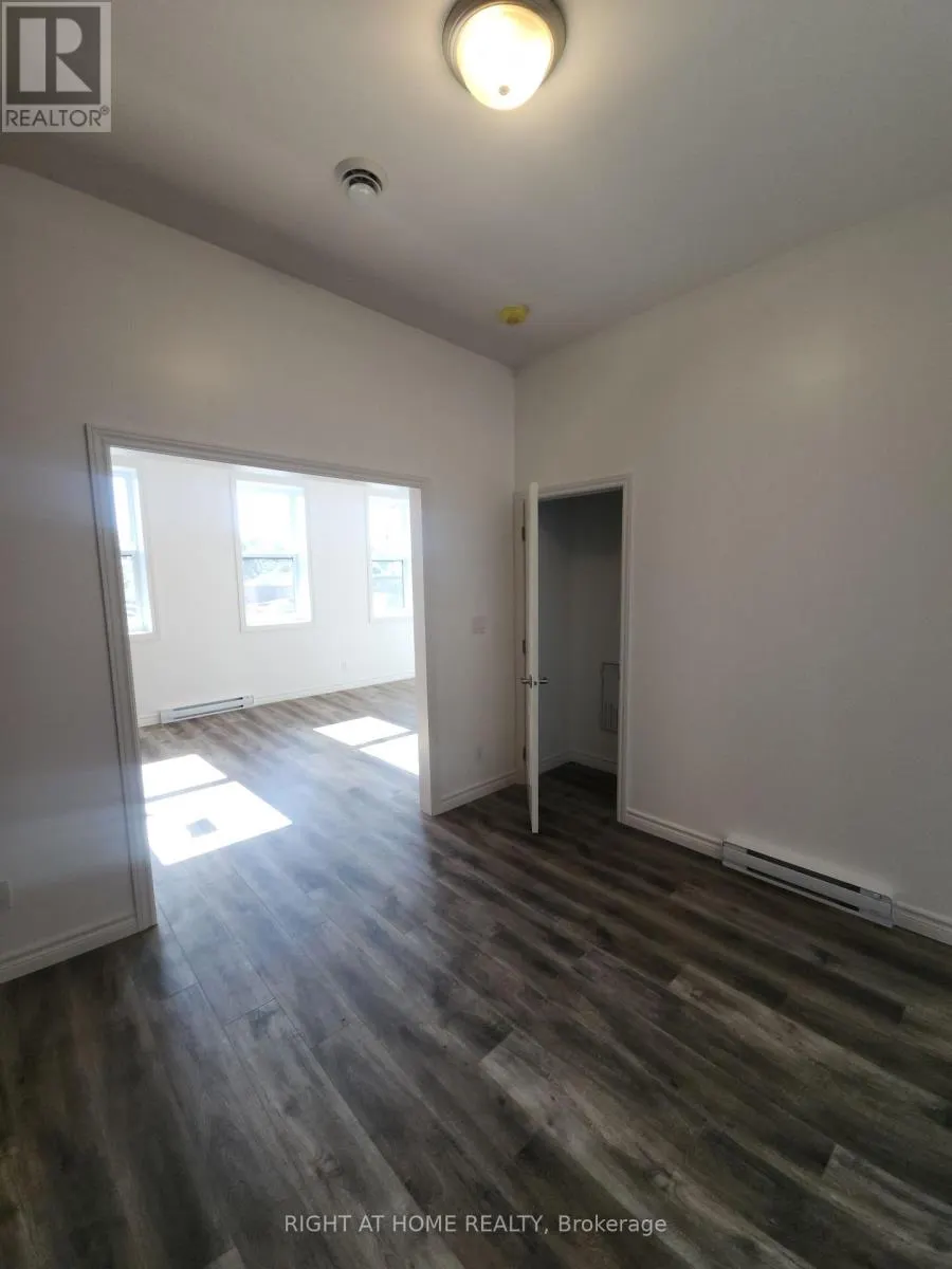 201 - 9 QUEEN STREET W