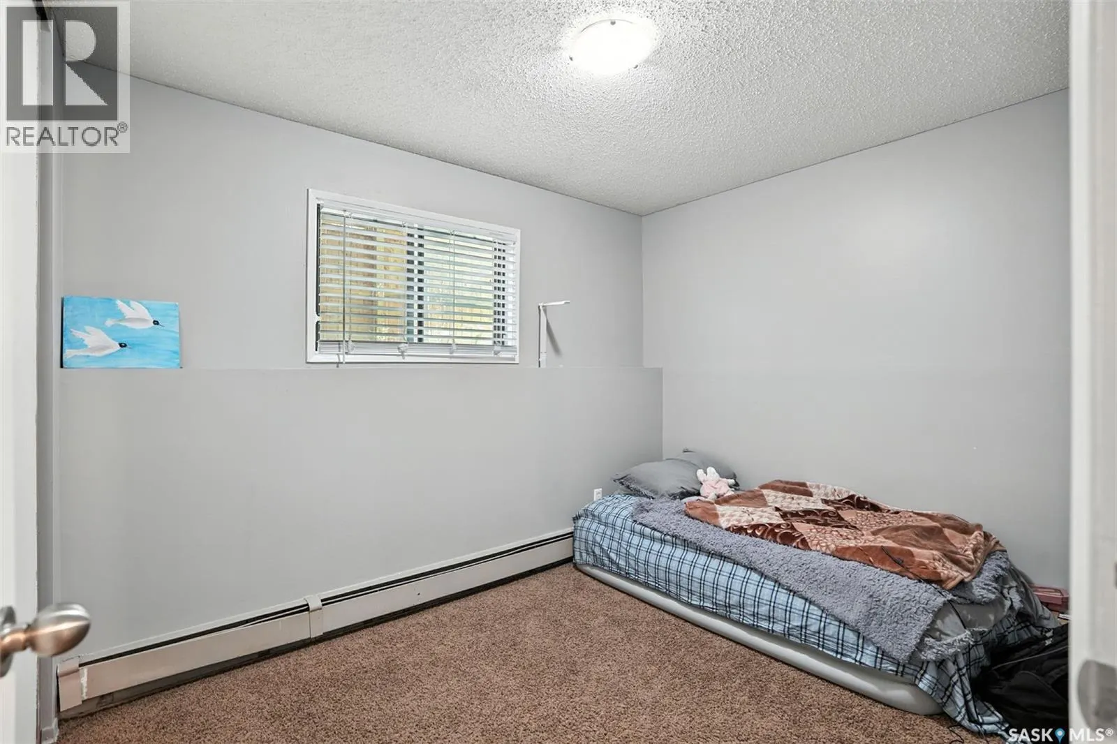 103 624 8th STREET E