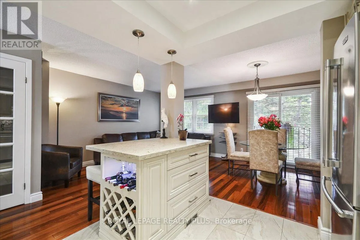 103 - 1951 RATHBURN ROAD E