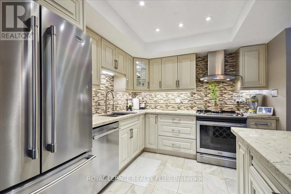 103 - 1951 RATHBURN ROAD E