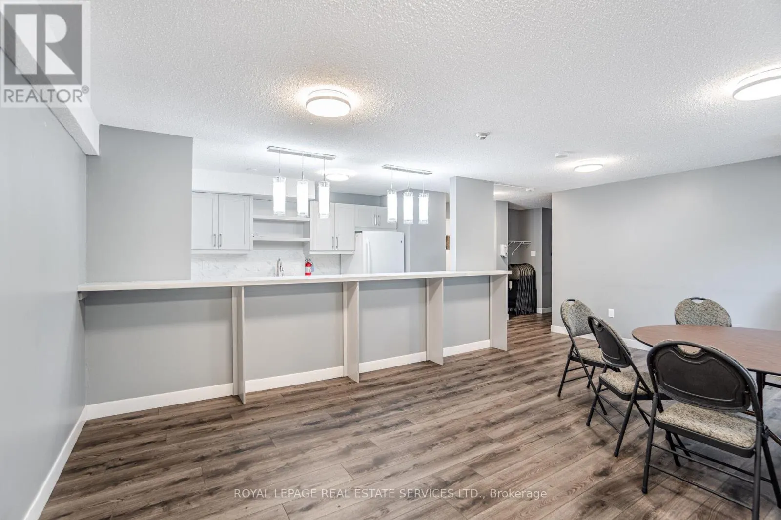 102 - 3590 KANEFF CRESCENT