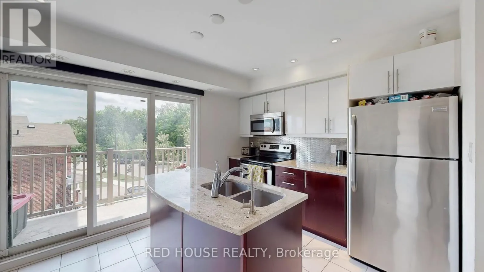 2 - 5585 OSCAR PETERSON BOULEVARD