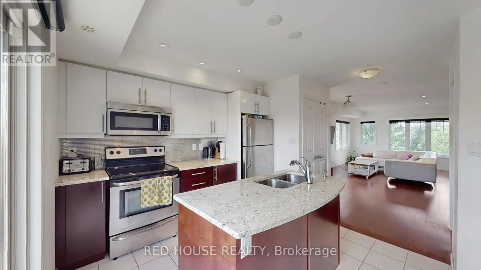 2 - 5585 OSCAR PETERSON BOULEVARD