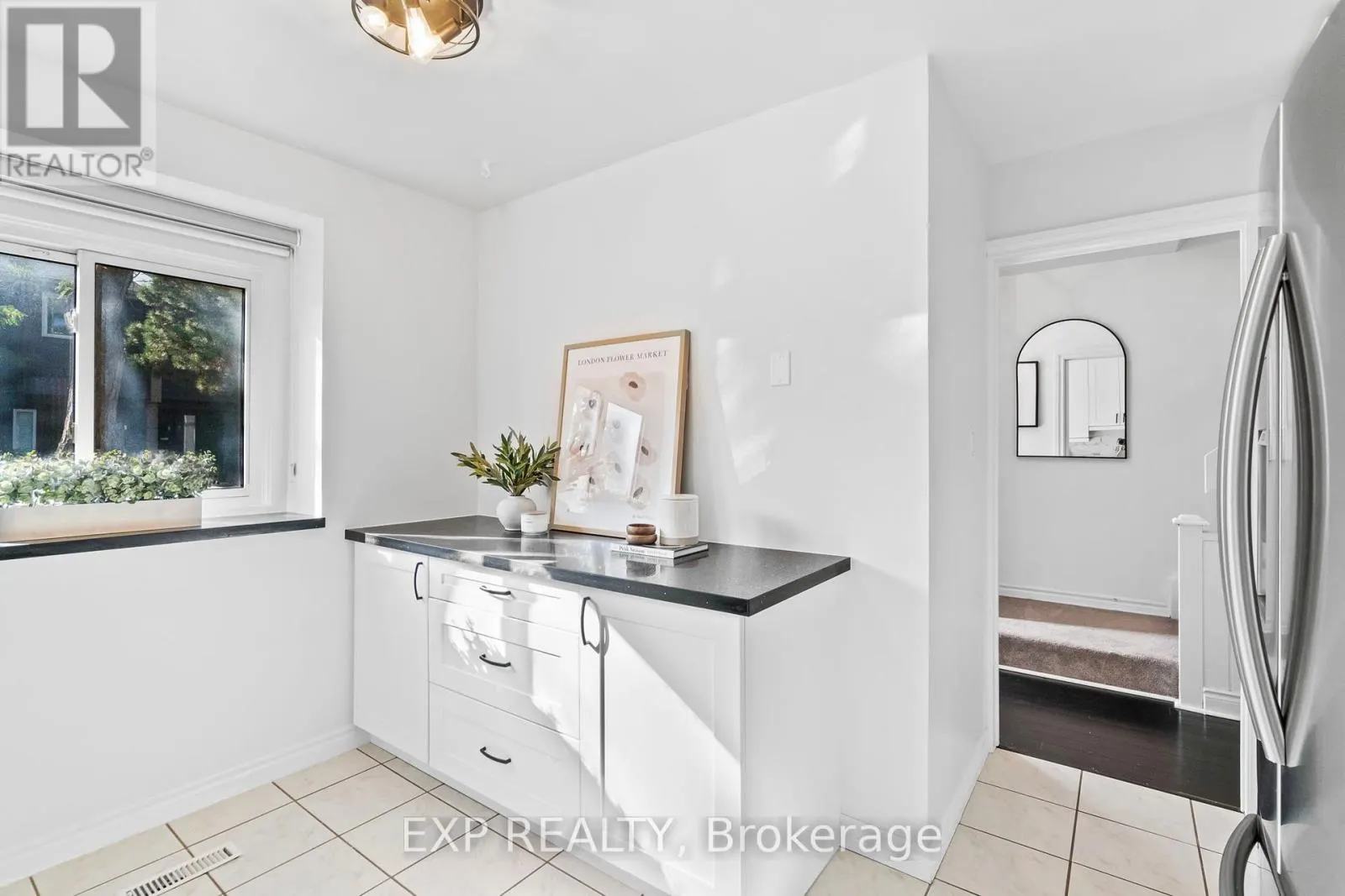 21 - 6855 GLEN ERIN DRIVE