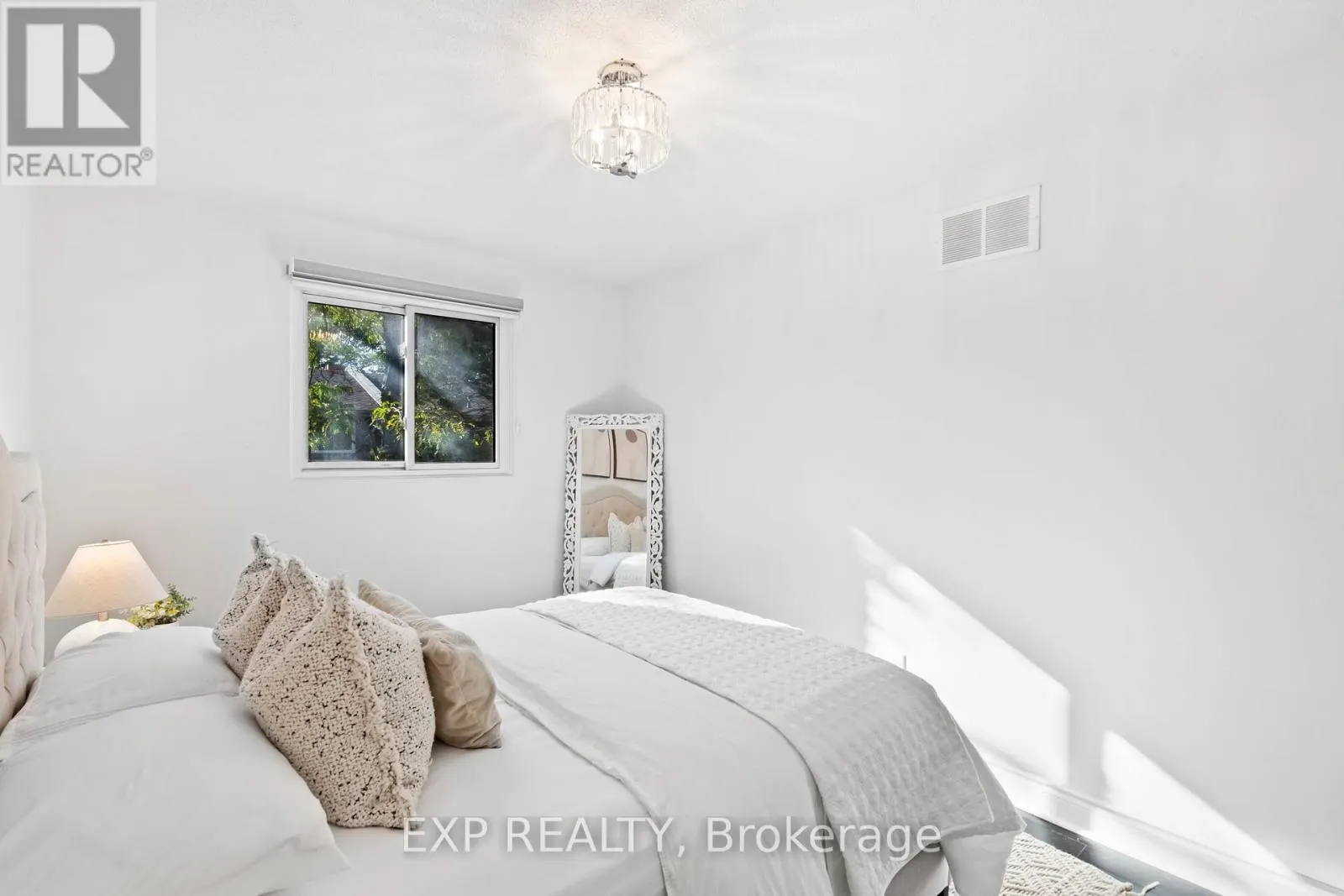21 - 6855 GLEN ERIN DRIVE