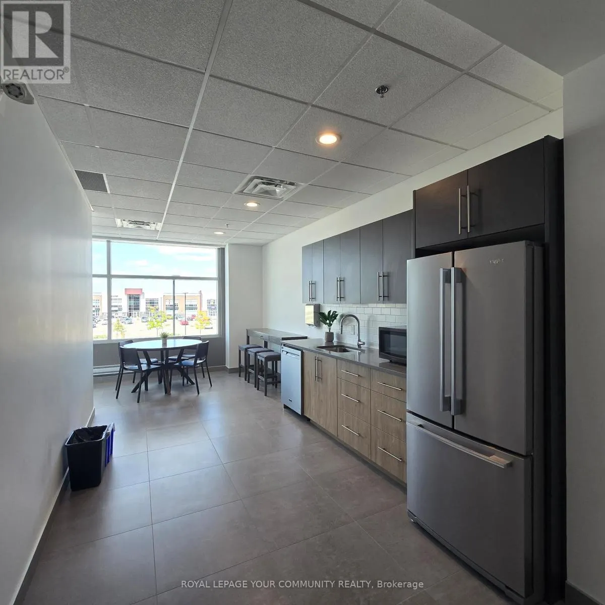 104 - 3495 REBECCA STREET