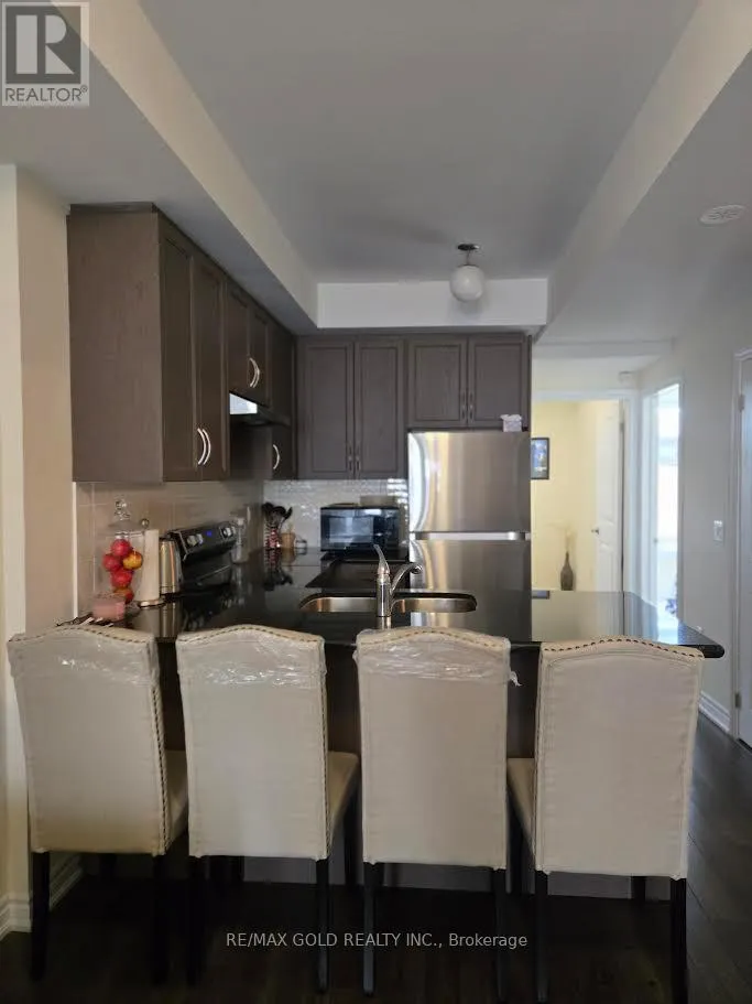 202 - 30 HALLIFORD PLACE