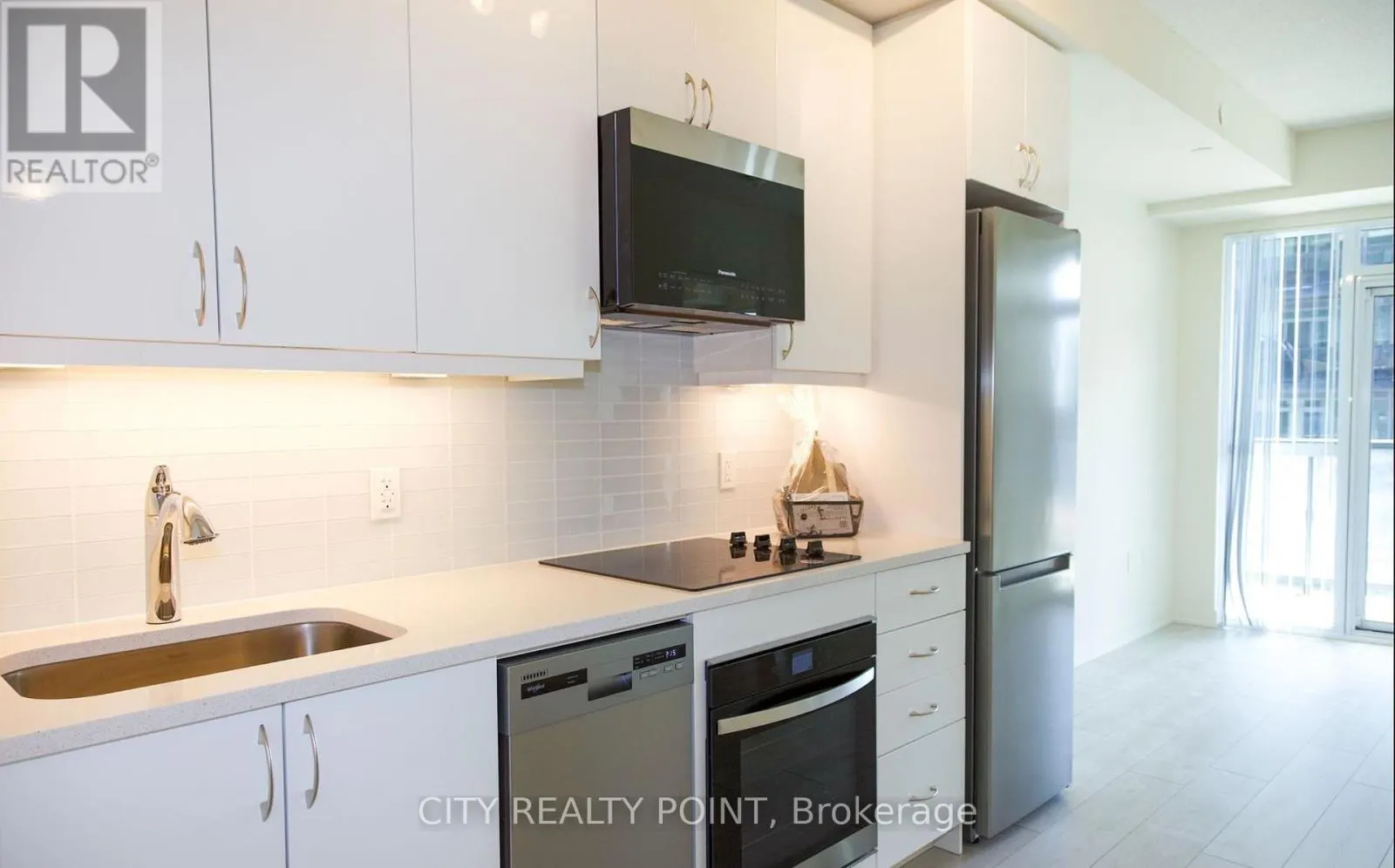 1406 - 38 ANNIE CRAIG DRIVE