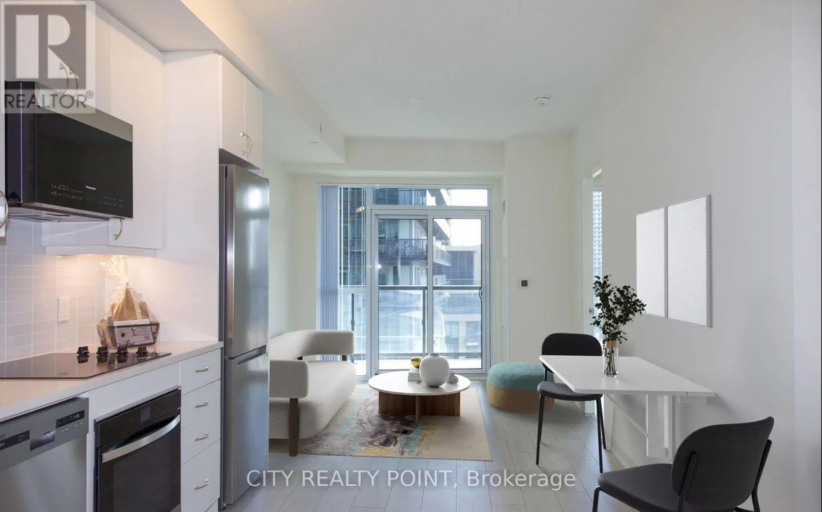 1406 - 38 ANNIE CRAIG DRIVE