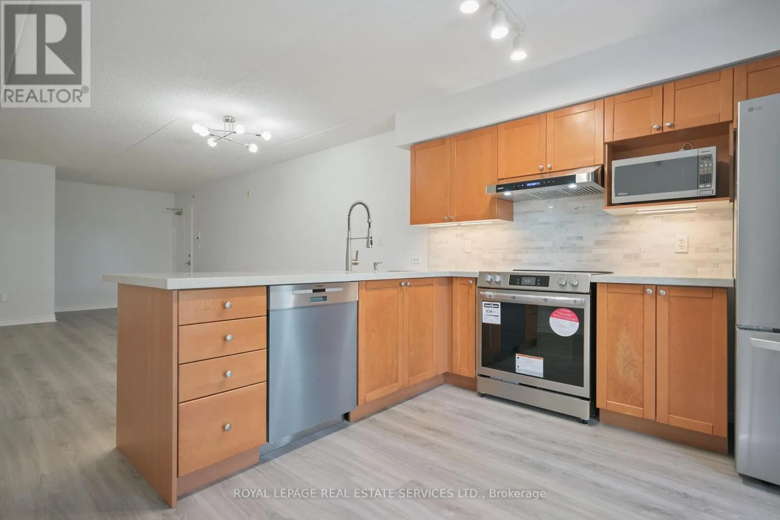 207 - 1450 BISHOPS GATE