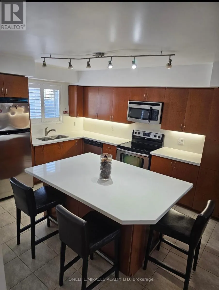 6 - 5055 OSCAR PETERSON BOULEVARD
