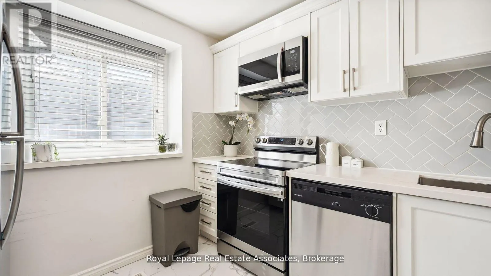 20 - 6855 GLEN ERIN DRIVE