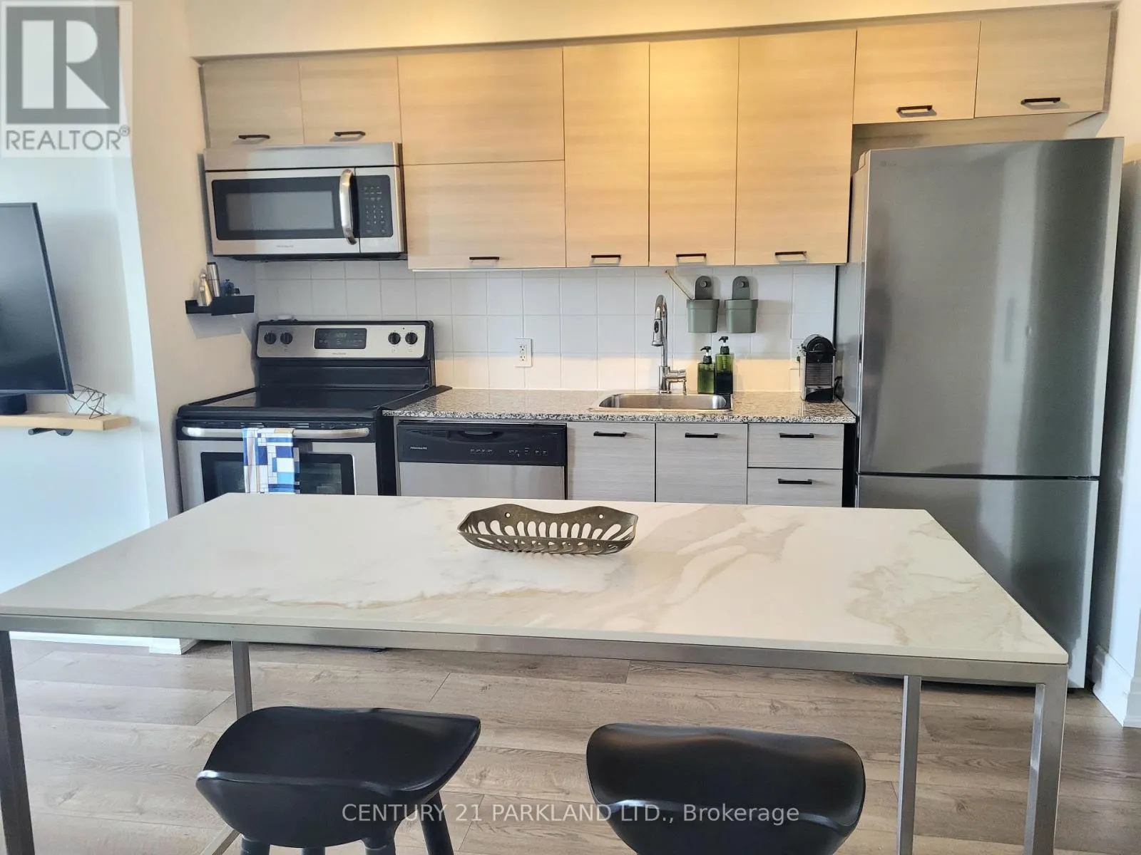 1215 - 20 JOE SHUSTER WAY