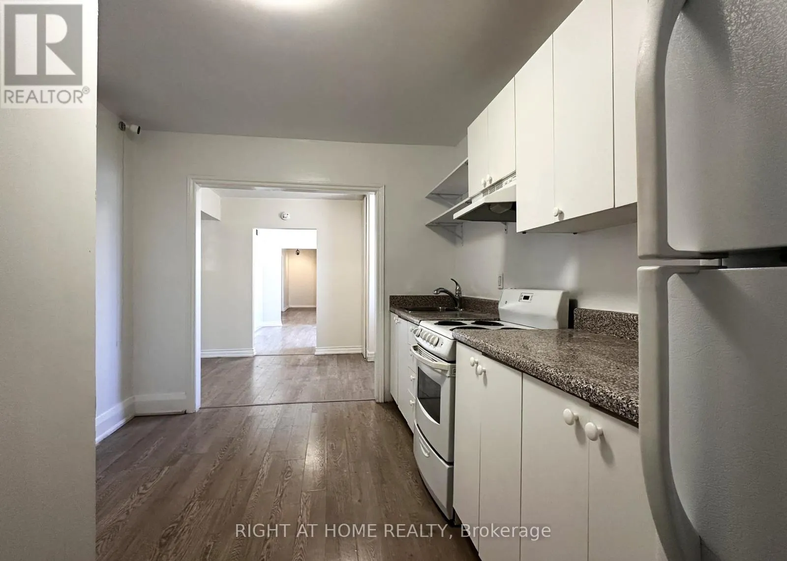 202 - 1911 WESTON ROAD