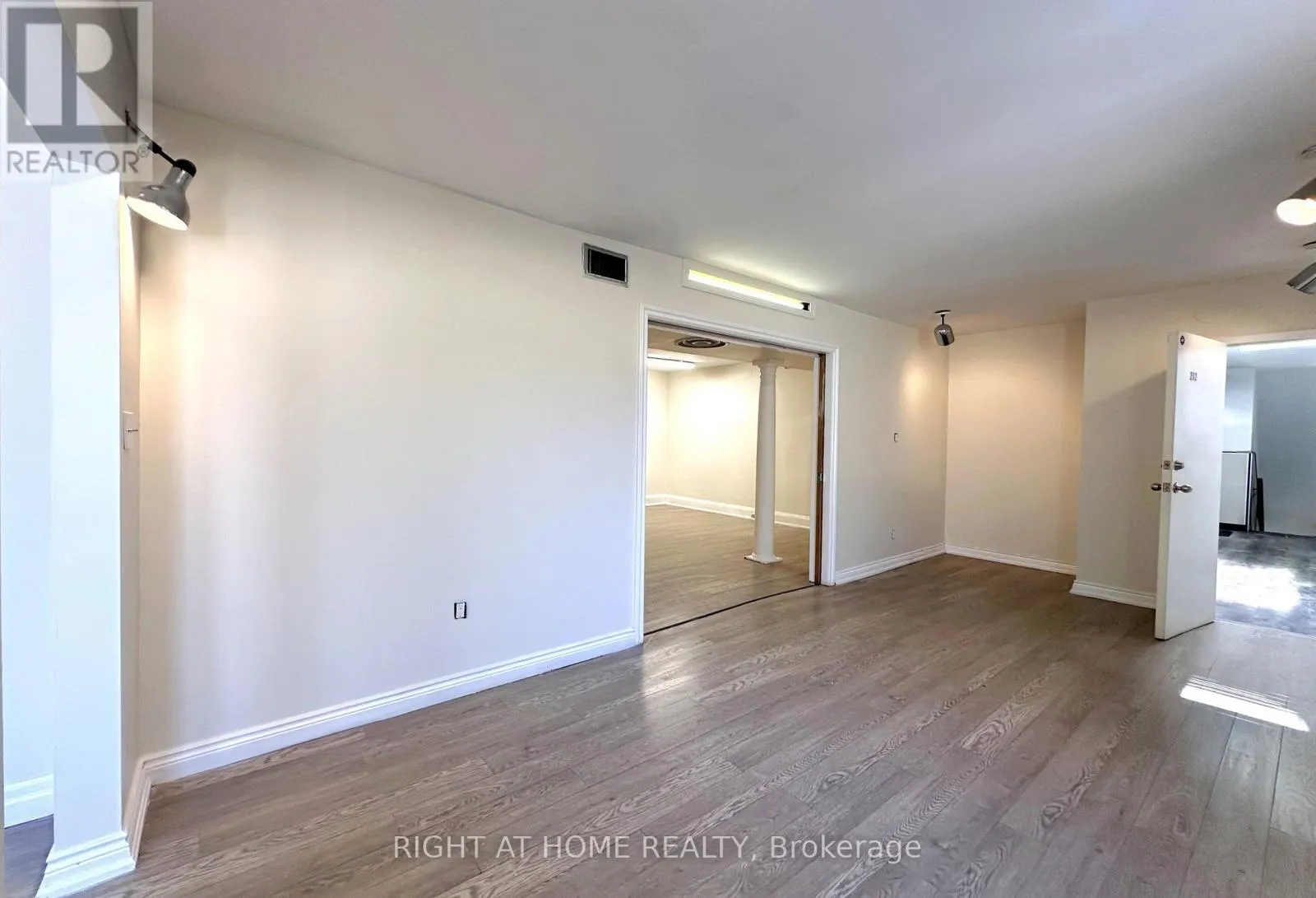 202 - 1911 WESTON ROAD