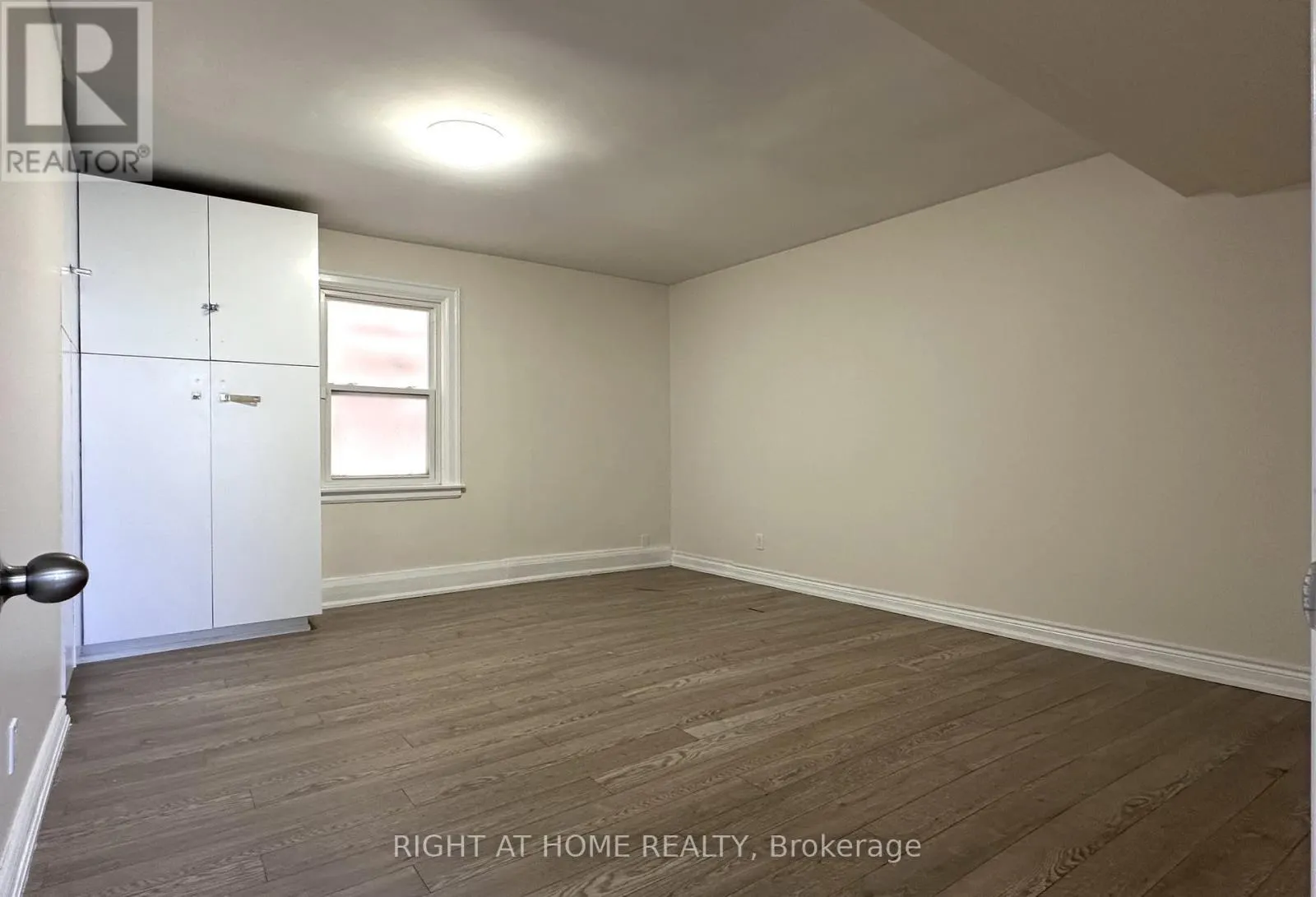 202 - 1911 WESTON ROAD