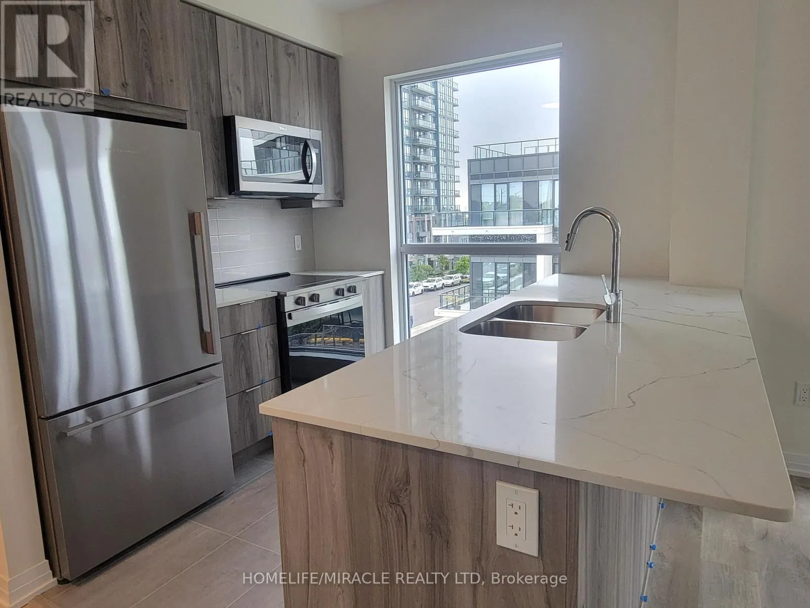 210 - 15 WATERGARDEN DRIVE