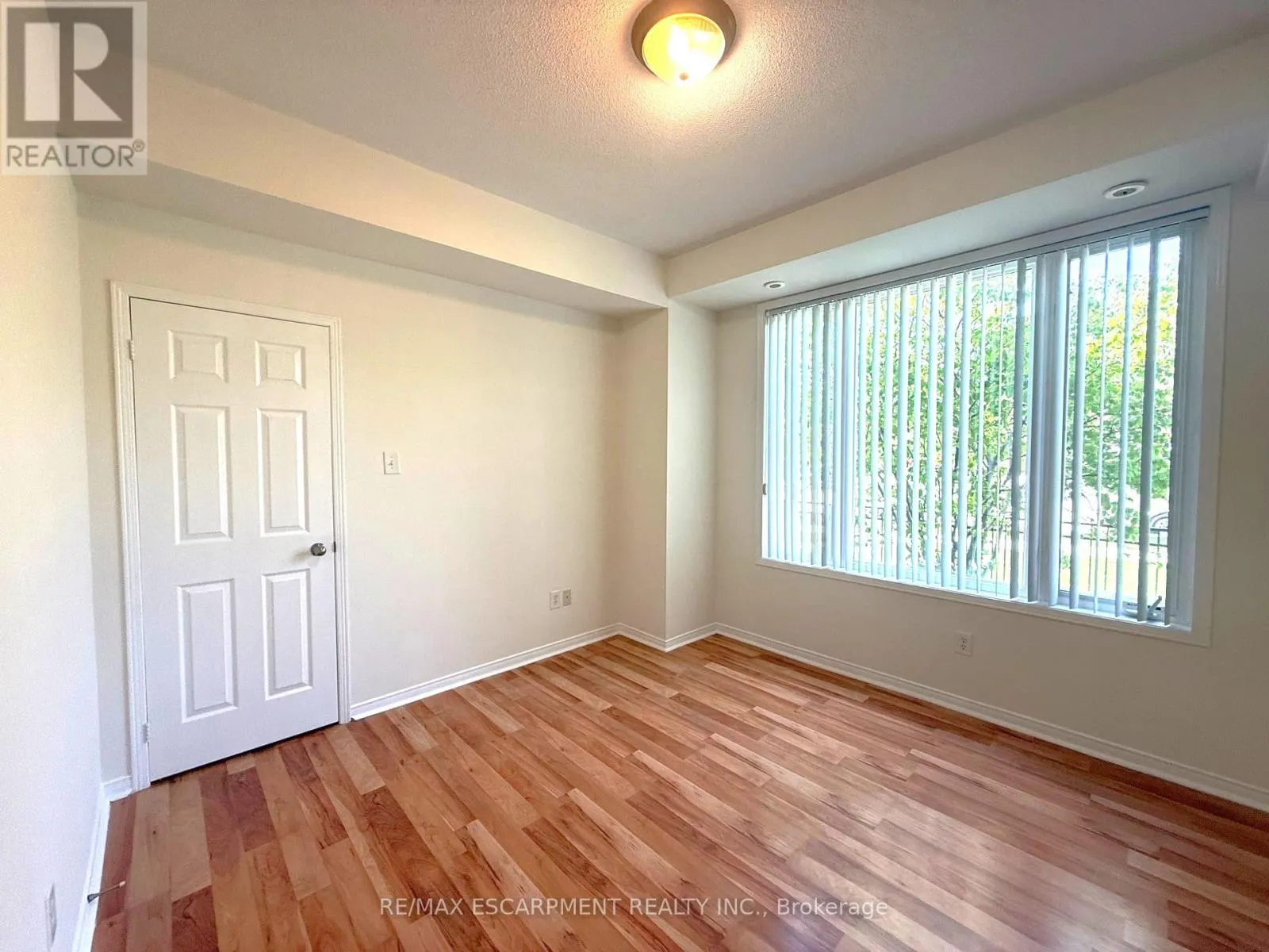 8 - 5055 OSCAR PETERSON BOULEVARD