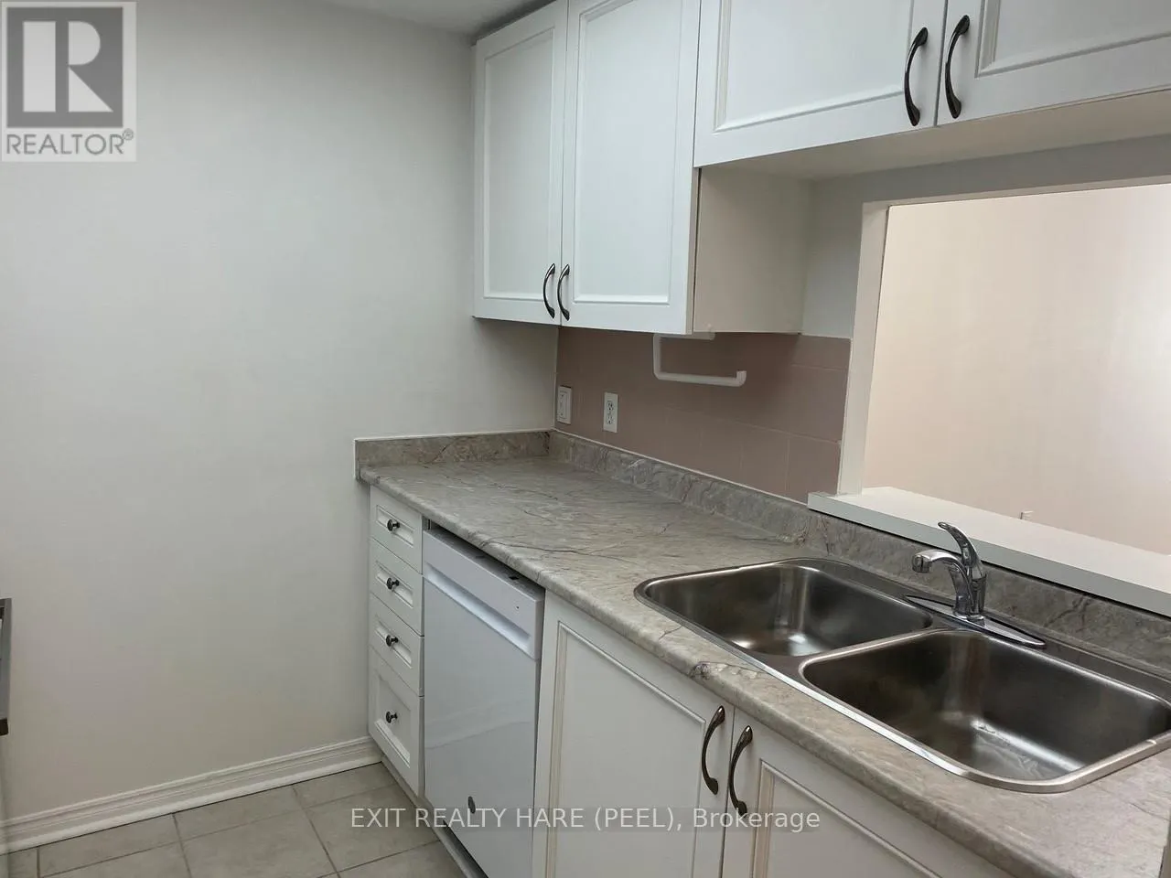 102 - 8351 MCLAUGHLIN ROAD S