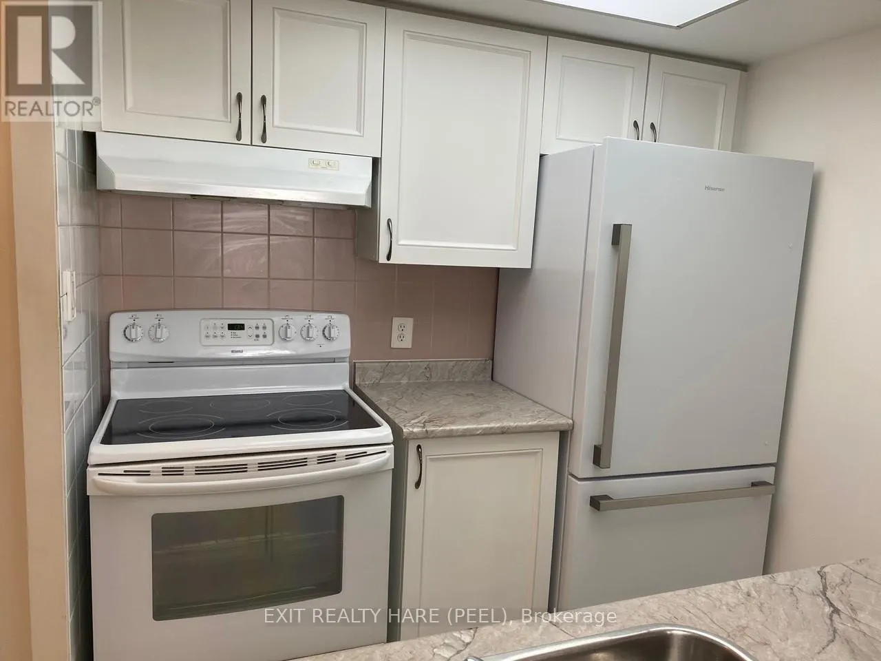 102 - 8351 MCLAUGHLIN ROAD S