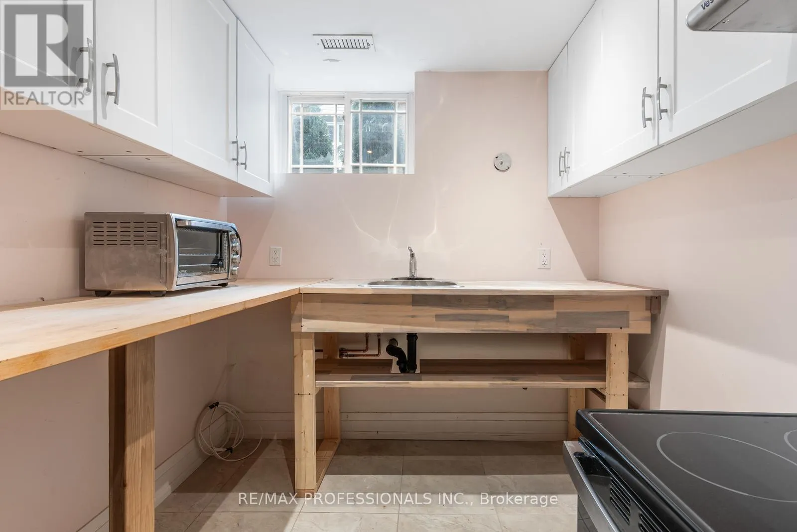 BSMT - 2106 LAWRENCE AVENUE W