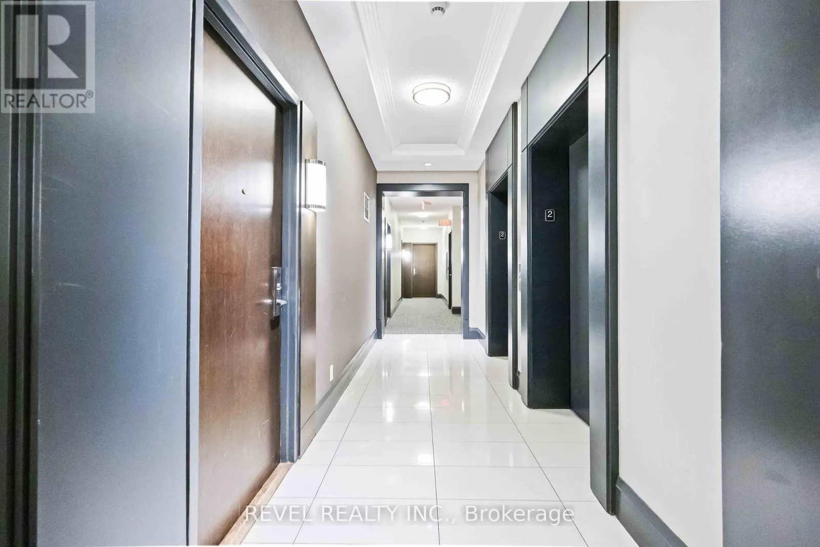 209 - 1185 THE QUEENSWAY