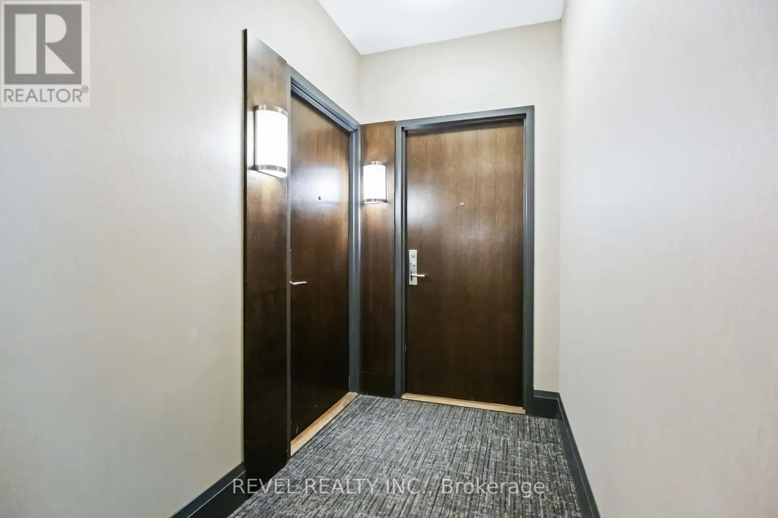 209 - 1185 THE QUEENSWAY