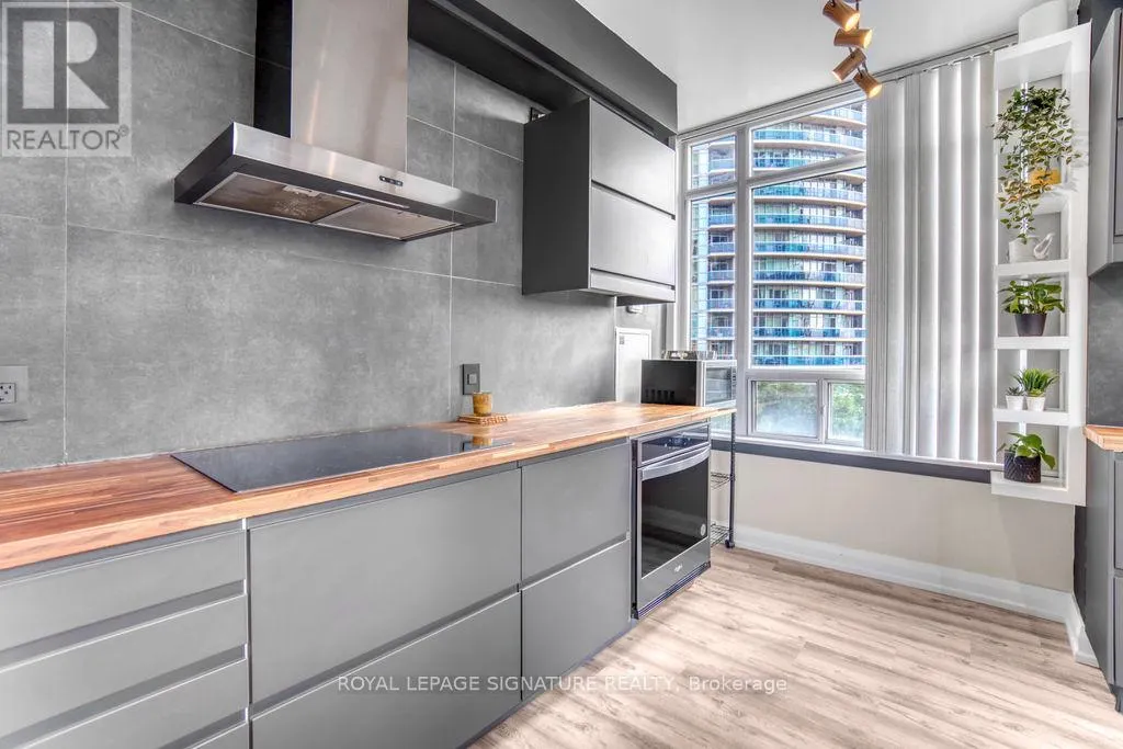 709 - 90 ABSOLUTE AVENUE