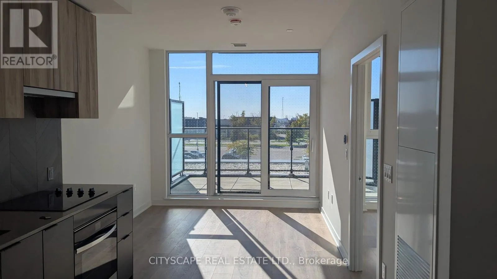 209 - 1037 QUEENSWAY
