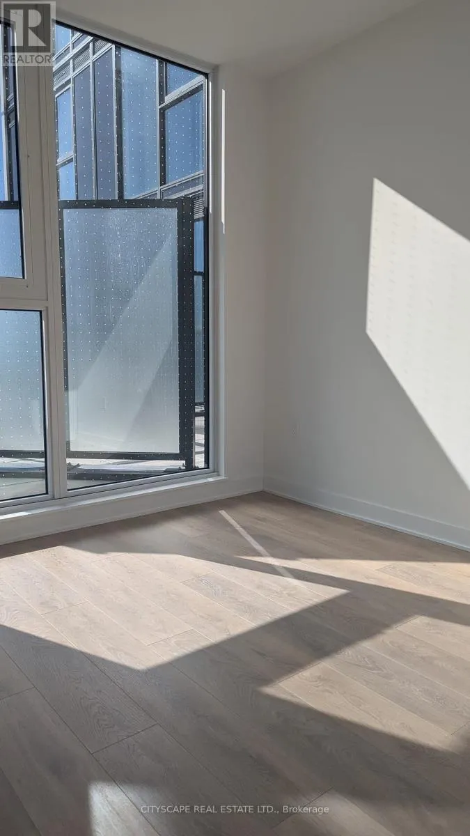 209 - 1037 QUEENSWAY