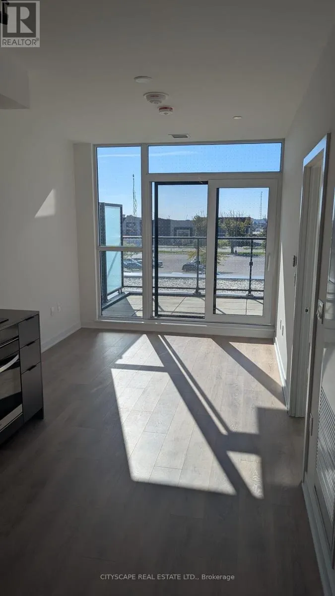 209 - 1037 QUEENSWAY