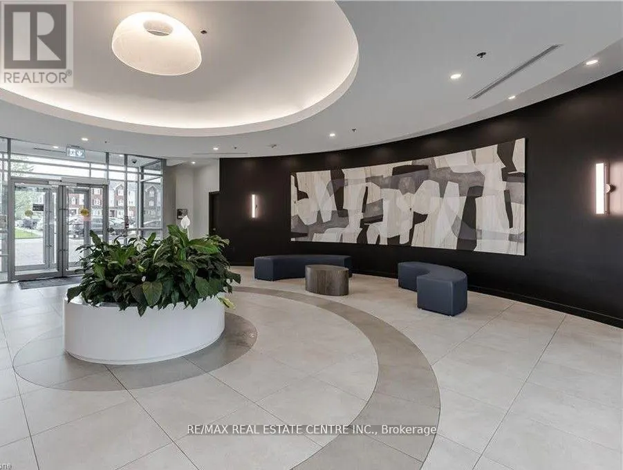301 - 215 QUEEN STREET E