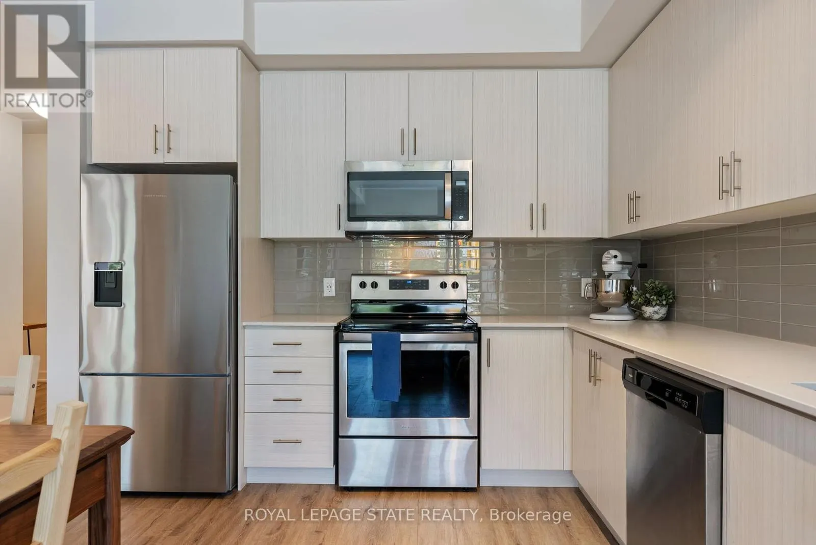 202 - 340 PLAINS ROAD E