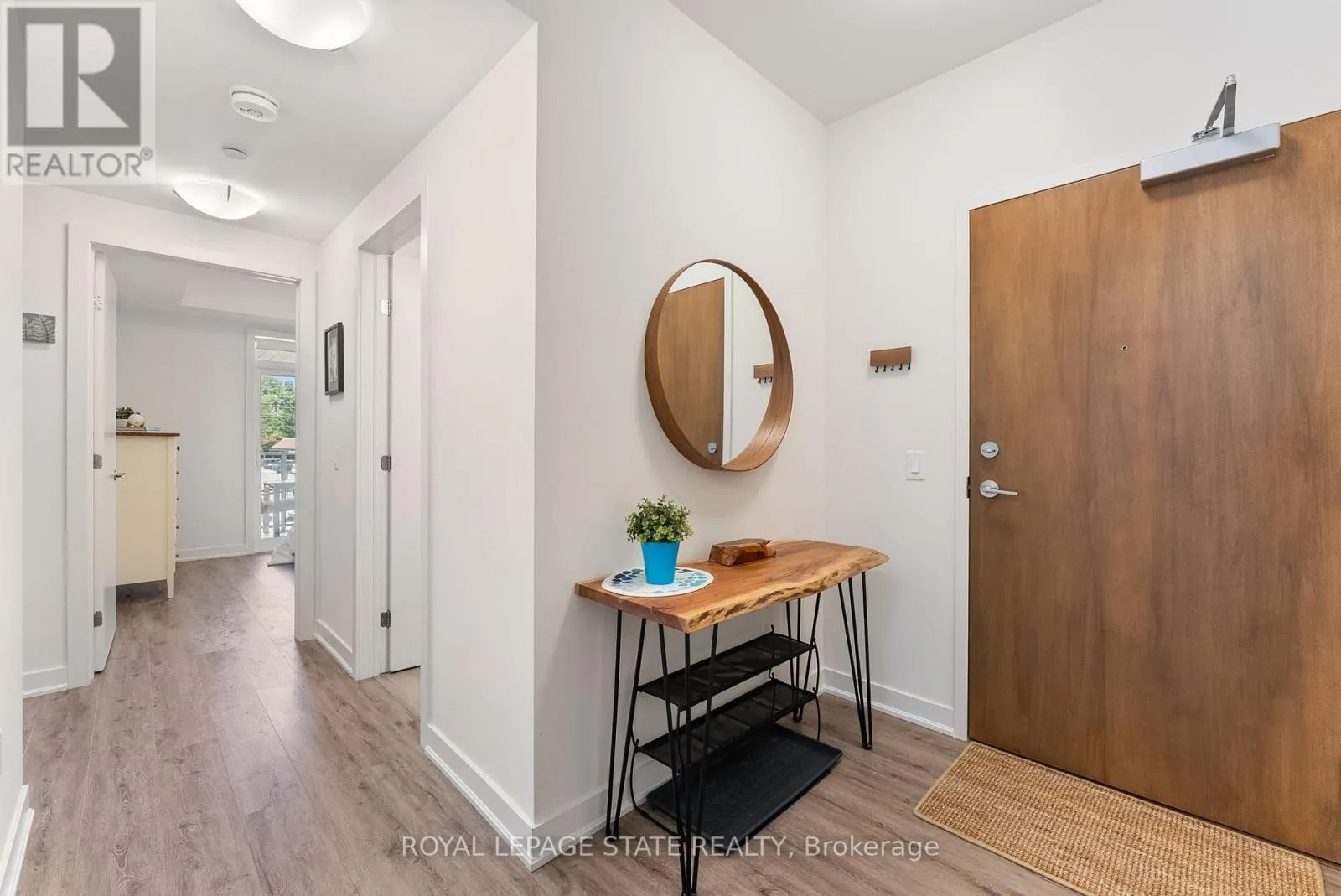 202 - 340 PLAINS ROAD E