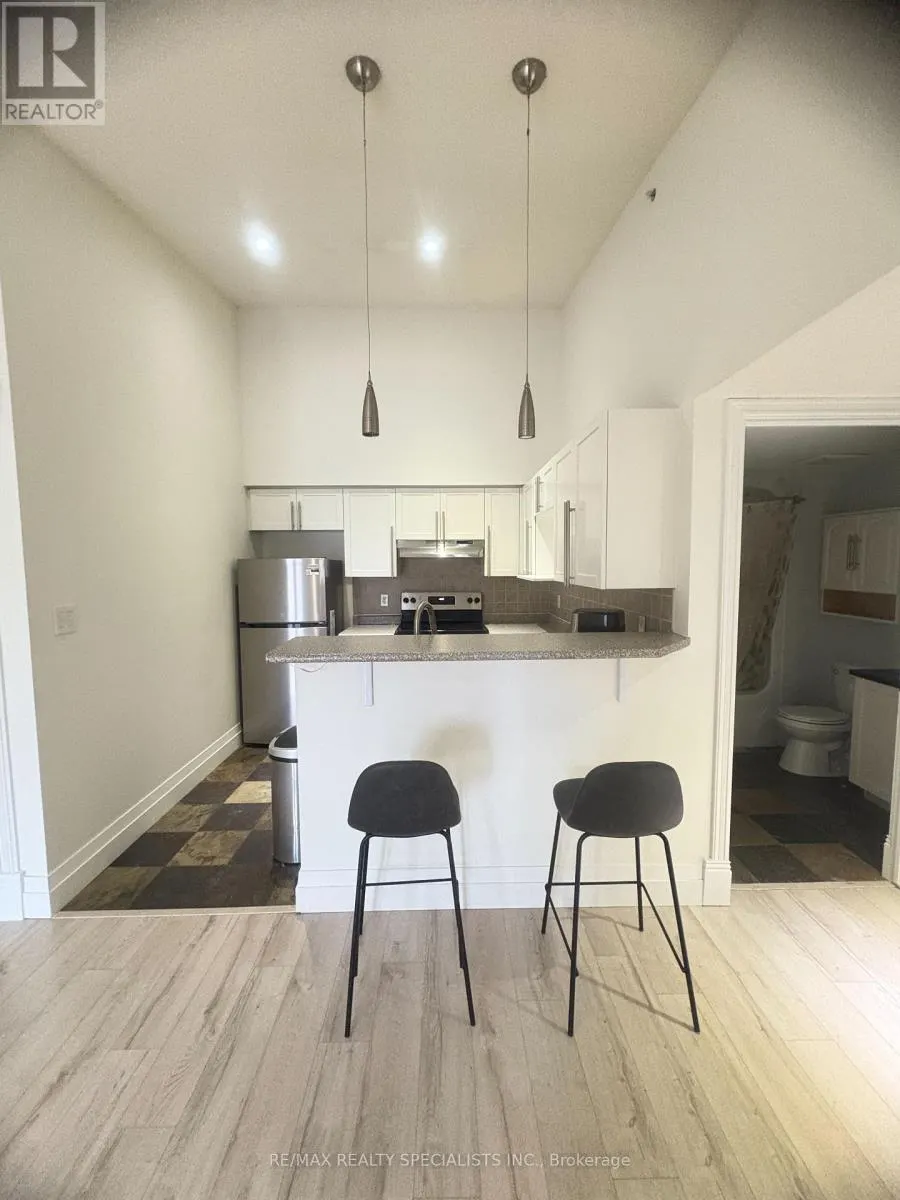 406 - 1440 BISHOPS GATE