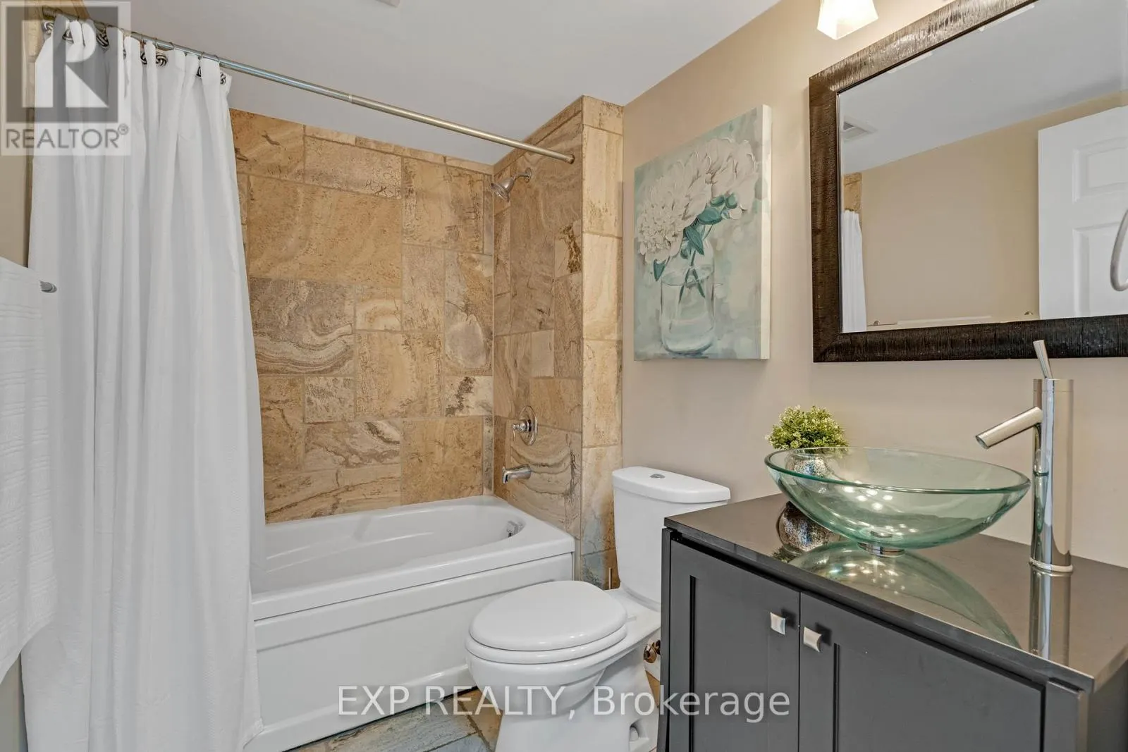 203 - 3605 KARIYA DRIVE